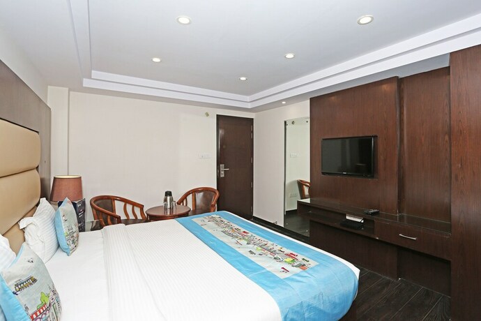 Imagen de la habitación del Hotel Oyo Flagship 22444 Shiwalik Regency Mall Road. Foto 2