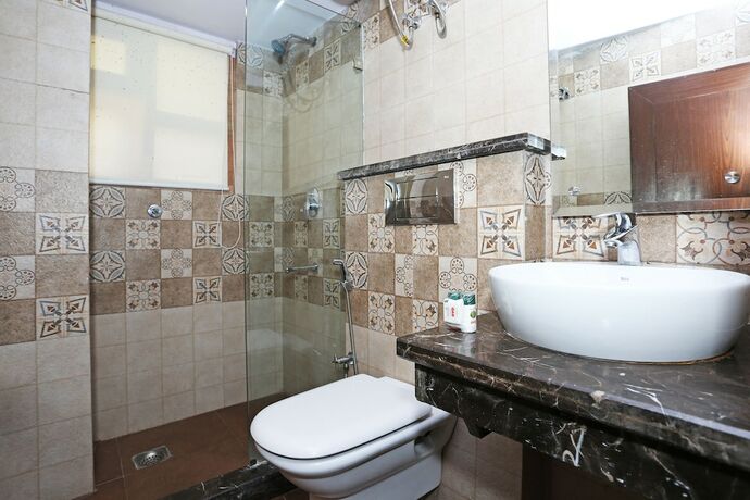 Imagen de la habitación del Hotel Oyo Flagship 22444 Shiwalik Regency Mall Road. Foto 4
