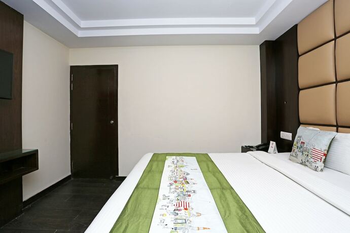 Imagen de la habitación del Hotel Oyo Flagship 22444 Shiwalik Regency Mall Road. Foto 10