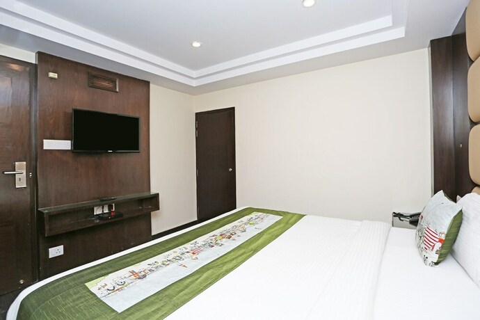 Imagen de la habitación del Hotel Oyo Flagship 22444 Shiwalik Regency Mall Road. Foto 11