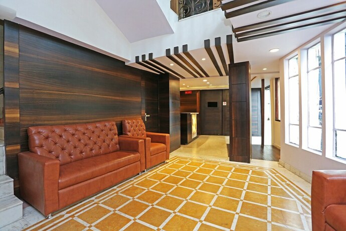 Imagen de los interiores del Hotel Oyo Flagship 22444 Shiwalik Regency Mall Road. Foto 14
