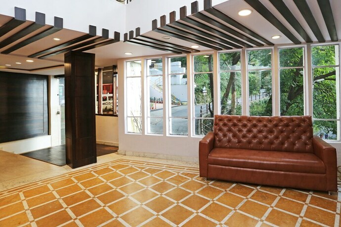 Imagen de los interiores del Hotel Oyo Flagship 22444 Shiwalik Regency Mall Road. Foto 15
