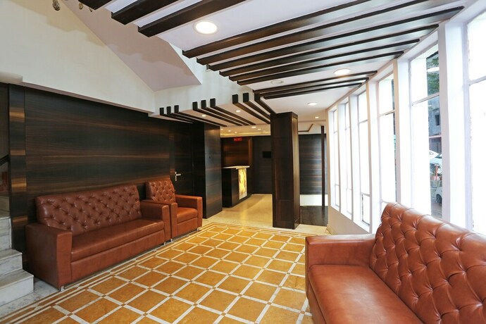 Imagen de los interiores del Hotel Oyo Flagship 22444 Shiwalik Regency Mall Road. Foto 17