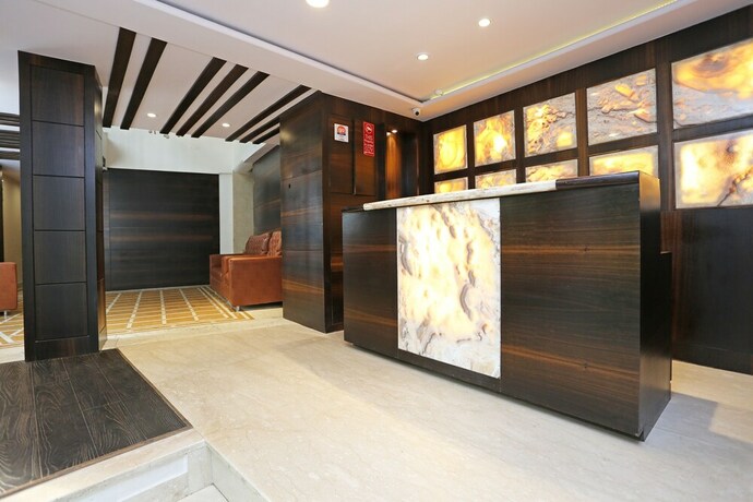 Imagen de los interiores del Hotel Oyo Flagship 22444 Shiwalik Regency Mall Road. Foto 18