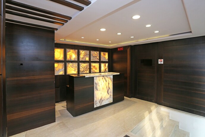 Imagen de los interiores del Hotel Oyo Flagship 22444 Shiwalik Regency Mall Road. Foto 19