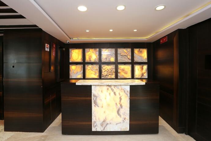 Imagen de los interiores del Hotel Oyo Flagship 22444 Shiwalik Regency Mall Road. Foto 20