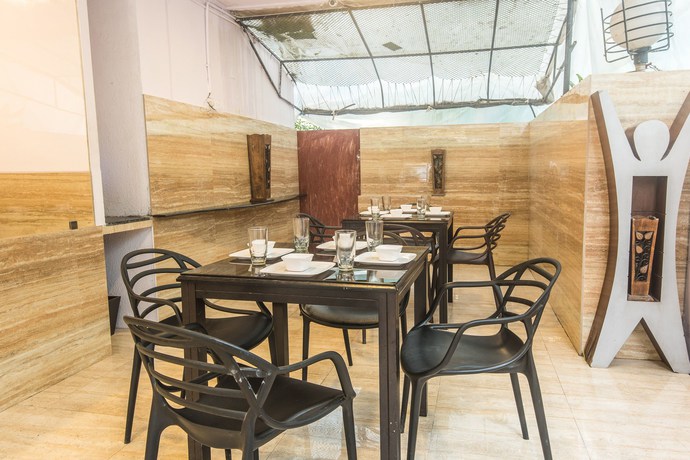 Imagen de la habitación del Hotel Oyo Flagship 573 Chakala Sahar Road. Foto 9