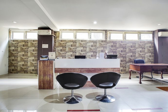 Imagen de los interiores del Hotel Oyo Flagship 91130 99 Lodaya. Foto 18