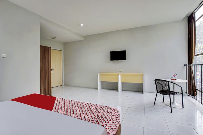 Imagen de la habitación del Hotel Oyo Flagship 91130 99 Lodaya. Foto 2