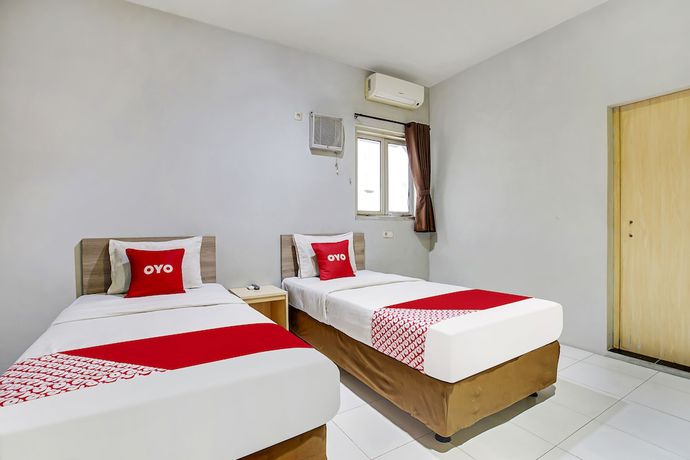 Imagen de la habitación del Hotel Oyo Flagship 91130 99 Lodaya. Foto 4