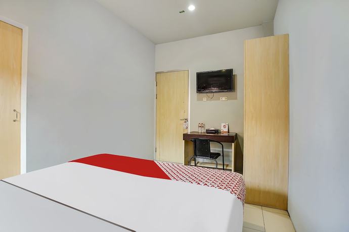 Imagen de la habitación del Hotel Oyo Flagship 91130 99 Lodaya. Foto 8