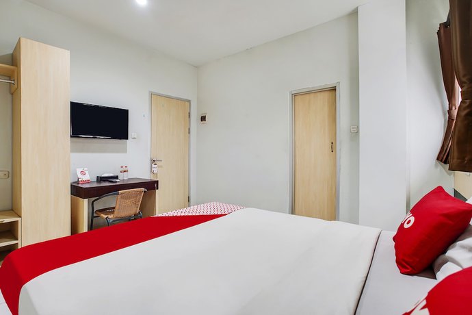Imagen de la habitación del Hotel Oyo Flagship 91130 99 Lodaya. Foto 10