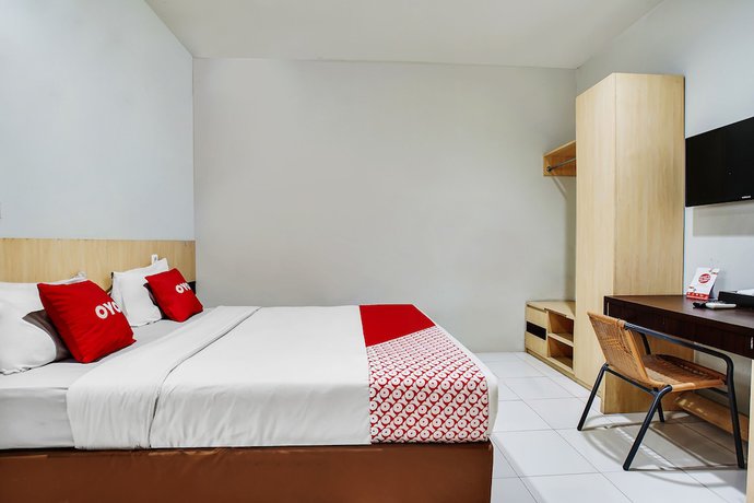 Imagen de la habitación del Hotel Oyo Flagship 91130 99 Lodaya. Foto 11