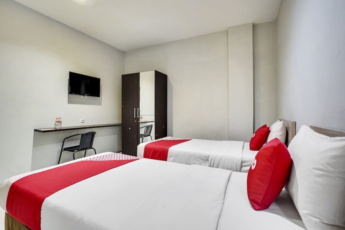 Imagen de la habitación del Hotel Oyo Flagship 91130 99 Lodaya. Foto 12