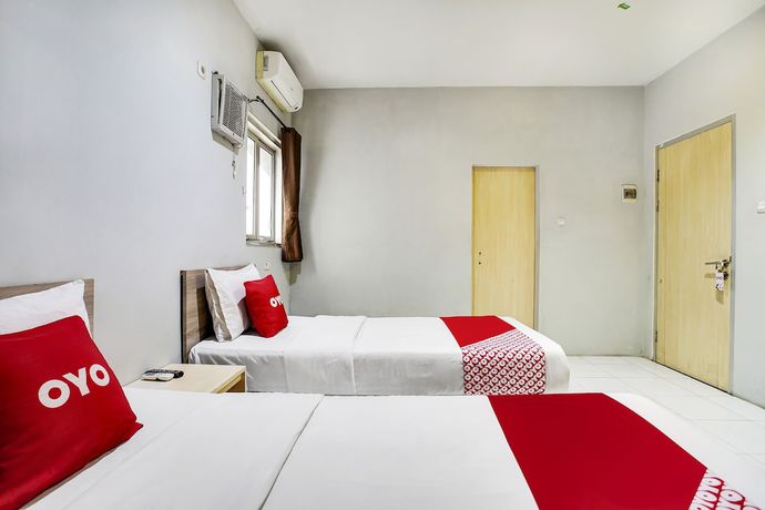 Imagen de la habitación del Hotel Oyo Flagship 91130 99 Lodaya. Foto 17