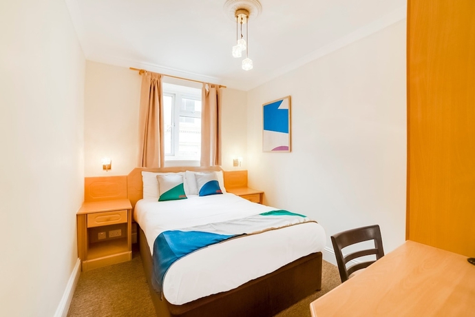 Imagen de la habitación del Hotel Oyo Gulliver's. Foto 2