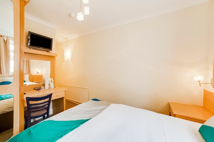Imagen de la habitación del Hotel Oyo Gulliver's. Foto 3