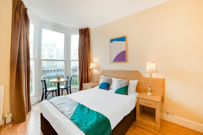 Imagen de la habitación del Hotel Oyo Gulliver's. Foto 8