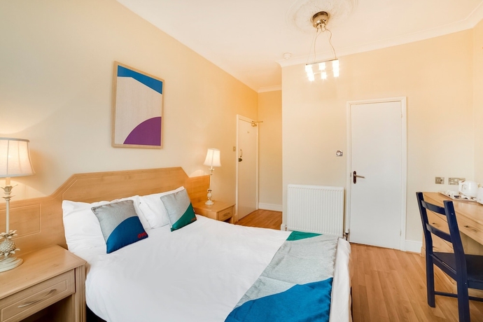 Imagen de la habitación del Hotel Oyo Gulliver's. Foto 9
