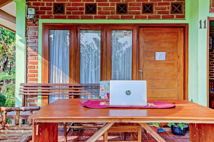 Imagen de los interiores del Hotel Oyo Homes 90849 Cibeunying Homestay Cibodas Maribaya. Foto 15