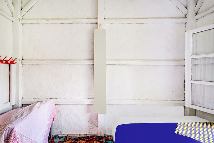 Imagen de la habitación del Hotel Oyo Homes 90850 Cibeunying Eco Tourism Homestay Cibodas Maribaya 2. Foto 4