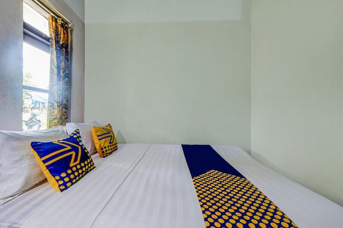 Imagen de la habitación del Hotel Oyo Homes 90987 Desa Wisata Gabugan Syariah. Foto 6