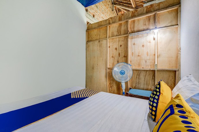 Imagen de la habitación del Hotel Oyo Homes 90987 Desa Wisata Gabugan Syariah. Foto 7