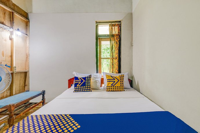 Imagen de la habitación del Hotel Oyo Homes 90987 Desa Wisata Gabugan Syariah. Foto 11