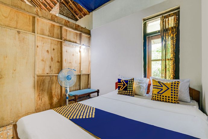 Imagen de la habitación del Hotel Oyo Homes 90987 Desa Wisata Gabugan Syariah. Foto 12