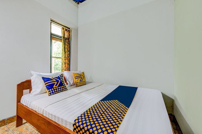 Imagen de la habitación del Hotel Oyo Homes 90987 Desa Wisata Gabugan Syariah. Foto 14
