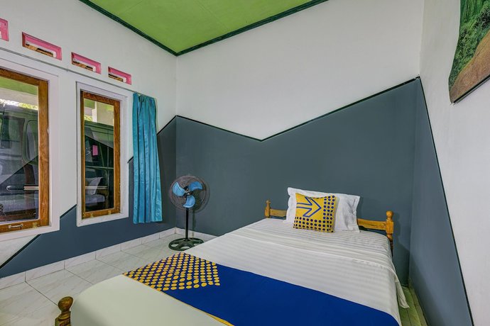 Imagen de la habitación del Hotel Oyo Homes 90987 Desa Wisata Gabugan Syariah. Foto 15