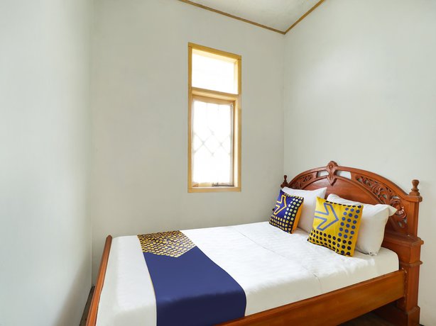 Imagen de la habitación del Hotel Oyo Homes 90992 Eco Tourism Desa Panundaan Ciwidey Syariah. Foto 2