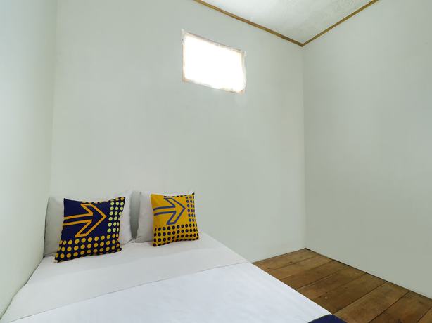 Imagen de la habitación del Hotel Oyo Homes 90992 Eco Tourism Desa Panundaan Ciwidey Syariah. Foto 8