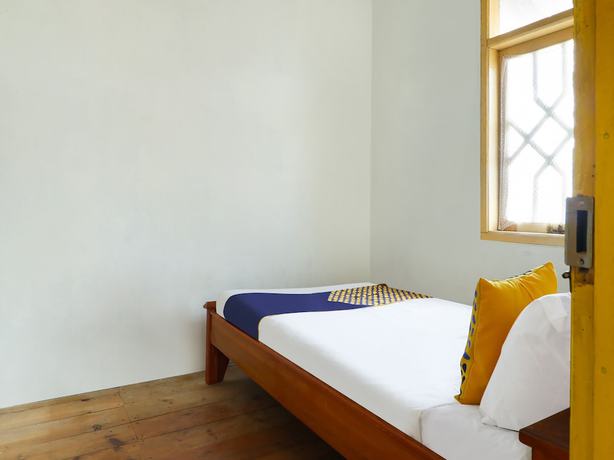 Imagen de la habitación del Hotel Oyo Homes 90992 Eco Tourism Desa Panundaan Ciwidey Syariah. Foto 11