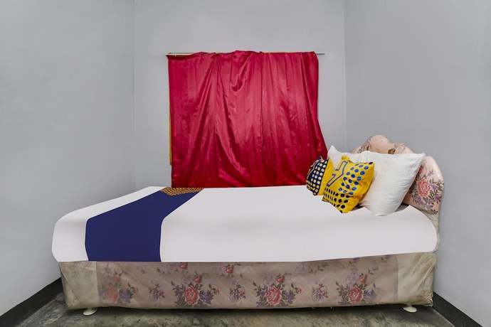 Imagen de la habitación del Hotel Oyo Homes 91011 Eco Tourism Desa Cibodas Areng 1 Syariah. Foto 2