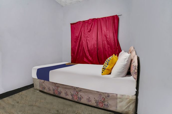 Imagen de la habitación del Hotel Oyo Homes 91011 Eco Tourism Desa Cibodas Areng 1 Syariah. Foto 6