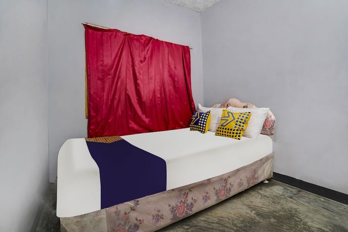 Imagen de la habitación del Hotel Oyo Homes 91011 Eco Tourism Desa Cibodas Areng 1 Syariah. Foto 7