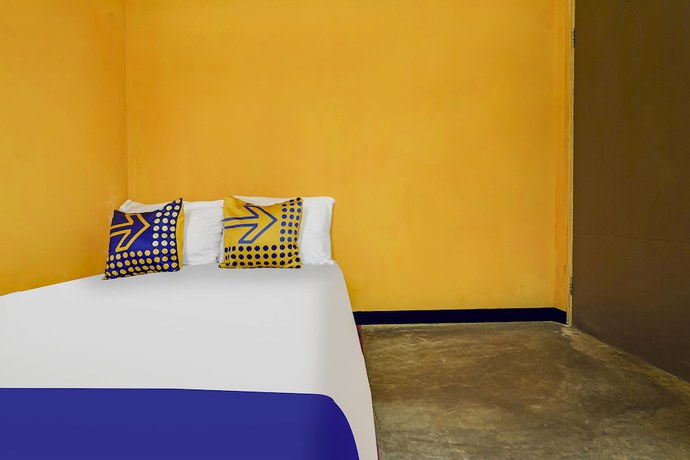 Imagen de la habitación del Hotel Oyo Homes 91011 Eco Tourism Desa Cibodas Areng 1 Syariah. Foto 8