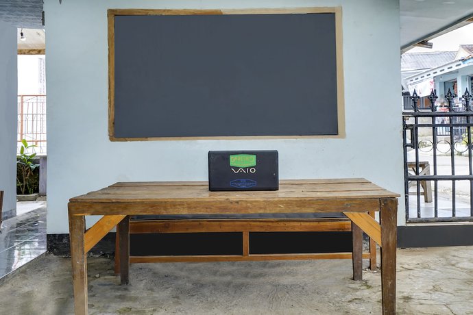 Imagen de los interiores del Hotel Oyo Homes 91011 Eco Tourism Desa Cibodas Areng 1 Syariah. Foto 19