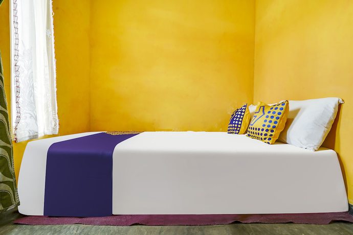 Imagen de la habitación del Hotel Oyo Homes 91011 Eco Tourism Desa Cibodas Areng 1 Syariah. Foto 12