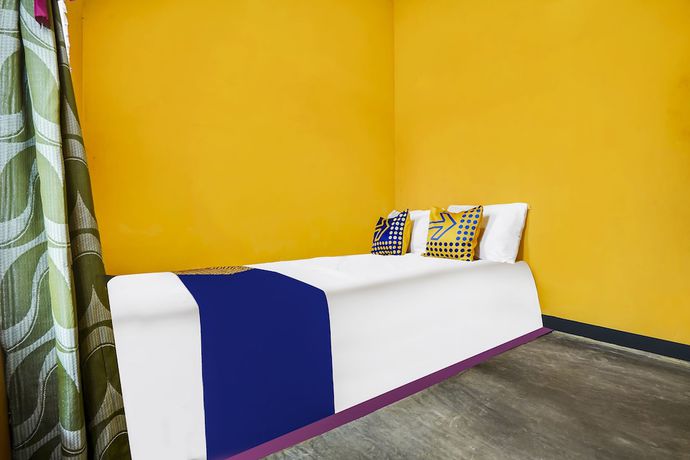 Imagen de la habitación del Hotel Oyo Homes 91011 Eco Tourism Desa Cibodas Areng 1 Syariah. Foto 13