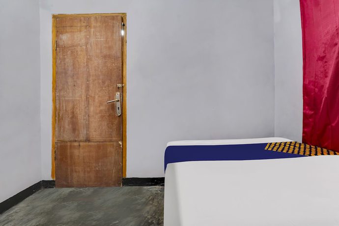 Imagen de la habitación del Hotel Oyo Homes 91011 Eco Tourism Desa Cibodas Areng 1 Syariah. Foto 14