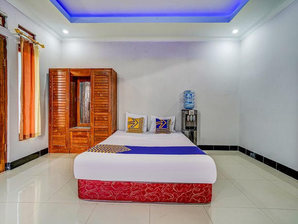 Imagen de la habitación del Hotel Oyo Homes 91014 Eco Tourism Desa Cibodas Areng 2 Syariah. Foto 12