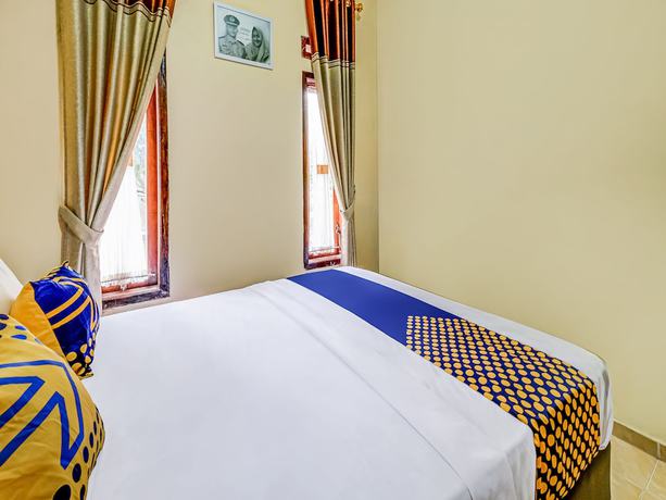 Imagen de la habitación del Hotel Oyo Homes 91067 Desa Wisata Santanamekar. Foto 2