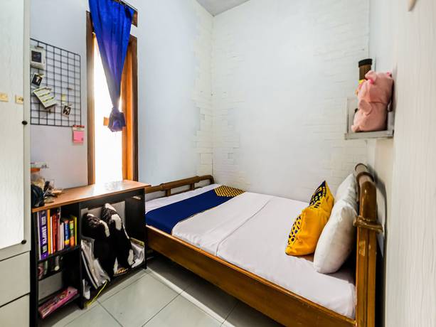 Imagen de la habitación del Hotel Oyo Homes 91067 Desa Wisata Santanamekar. Foto 3