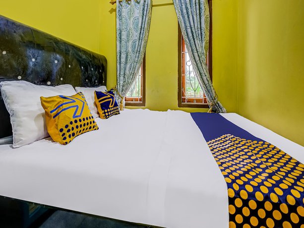 Imagen de la habitación del Hotel Oyo Homes 91067 Desa Wisata Santanamekar. Foto 4