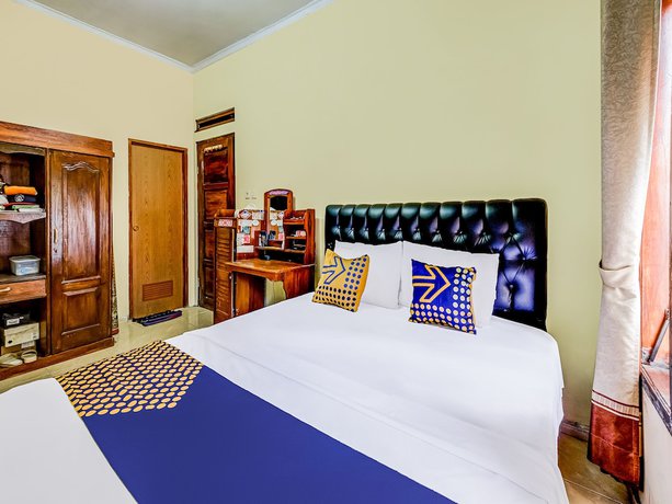 Imagen de la habitación del Hotel Oyo Homes 91067 Desa Wisata Santanamekar. Foto 8