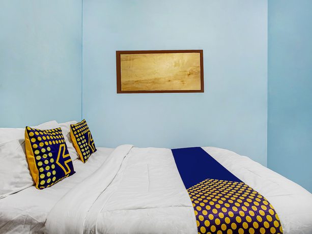 Imagen de la habitación del Hotel Oyo Homes 91089 Desa Wisata Air Terjun Way Kalam Syariah. Foto 5