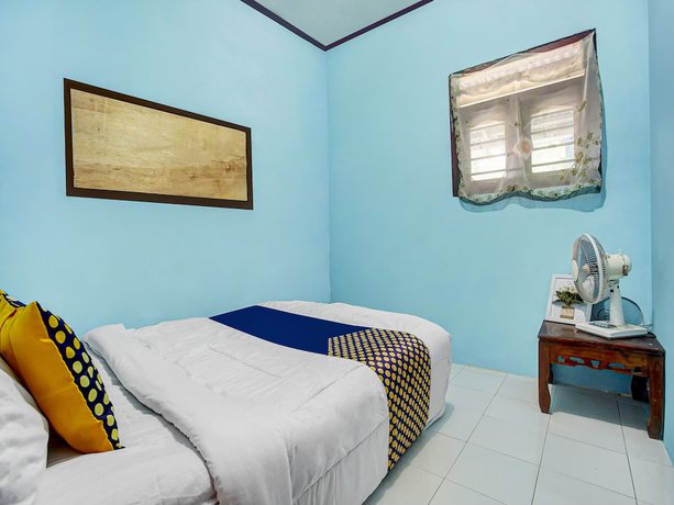 Imagen de la habitación del Hotel Oyo Homes 91089 Desa Wisata Air Terjun Way Kalam Syariah. Foto 8