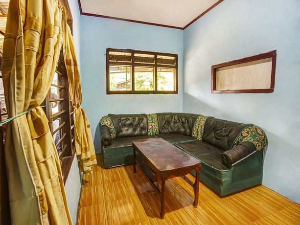 Imagen de los interiores del Hotel Oyo Homes 91089 Desa Wisata Air Terjun Way Kalam Syariah. Foto 20